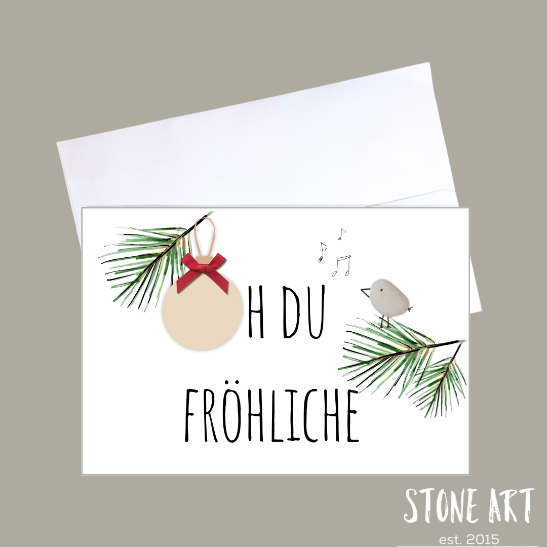 Handgemachte weiße Klappkarte mit Kieselstein, mit Spruch „Oh du fröhliche"