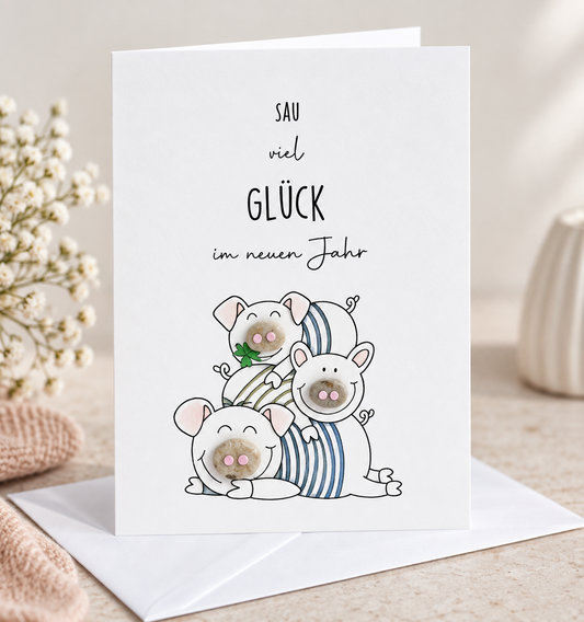 Handgemachte weiße Klappkarte mit Kieselstein, mit Spruch „Sau viel Glück" und Schwein