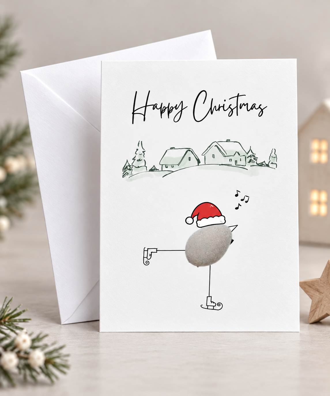 Weihnachtskarte „Happy Christmas" – Kieselstein-Vogel auf Schlittschuhen