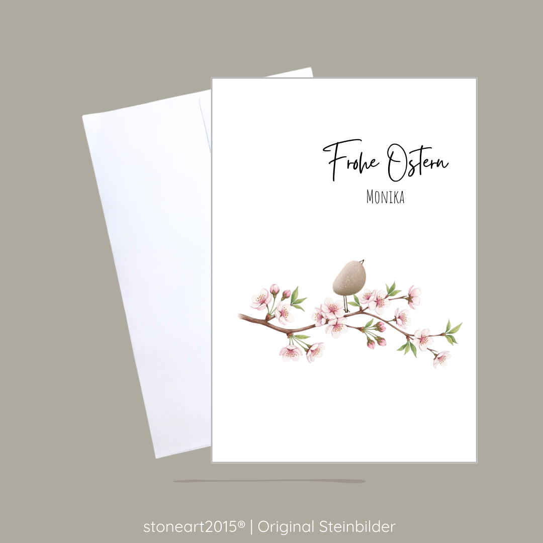 Handgemachte weiße Klappkarte mit Kieselstein, mit Spruch „Frohe Ostern" und Eier