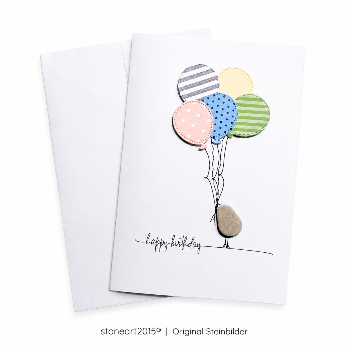 Handgemachte weiße Klappkarte mit Kieselstein, mit Spruch „Happy Birthday" und Luftballons