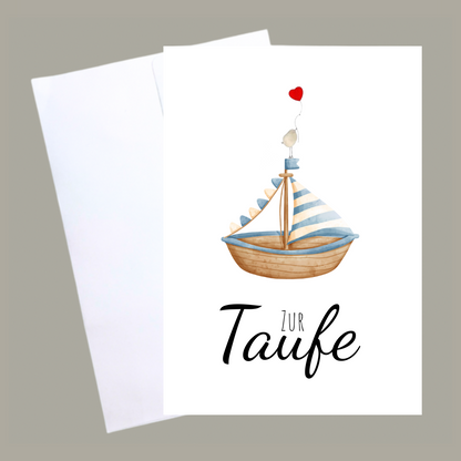 Handgemachte weiße Klappkarte mit Spruch „Zur Taufe" und Boot blau mit Vogel mit Umschlag