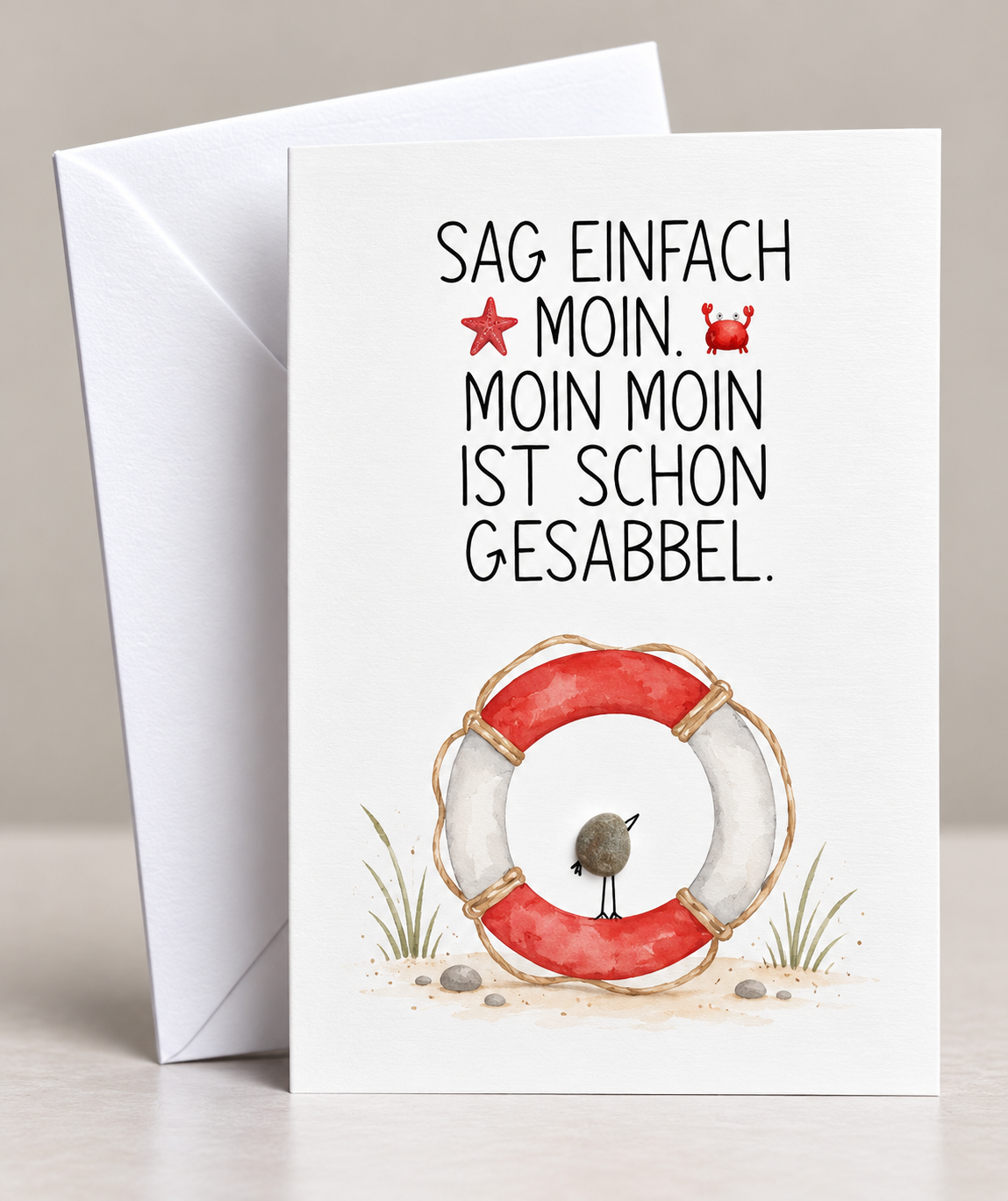 Handgemachte weiße Klappkarte mit Kieselstein, mit Spruch „Moin Moin"