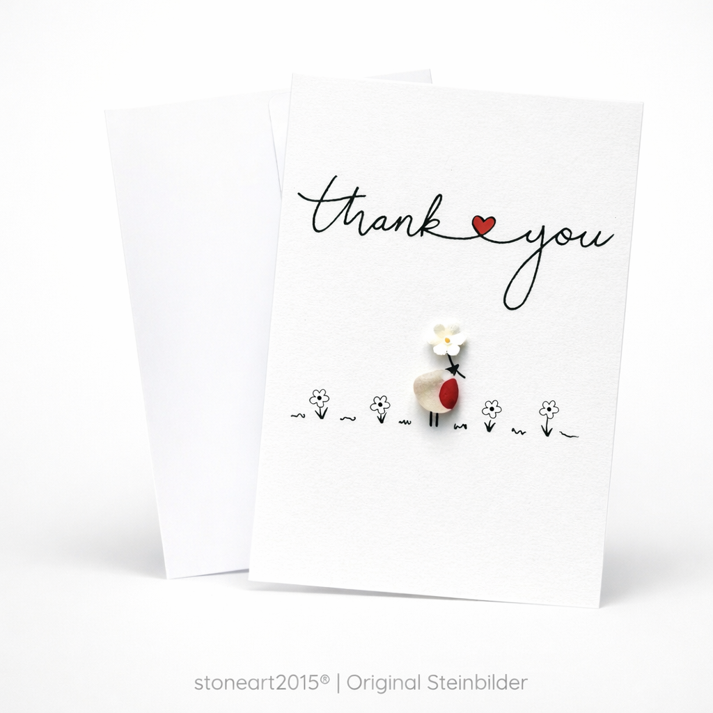Handgemachte weiße Klappkarte mit Kieselstein-Rotkehlchen mit weißer Blume, Schriftzug „thank you“ – Dankeskarte, Grußkarte mit Umschlag