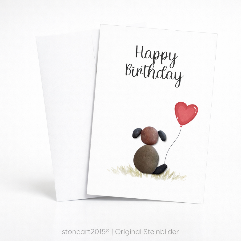 Handgemachte weiße Klappkarte mit Kieselstein-Hund und Herzballon, Schriftzug „Happy Birthday“ – Geburtstagskarte für Hundefreunde, Grußkarte mit Umschlag